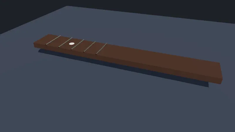 A dark brown fretboard lying on a blue-gray table, seen from above and to the side, with five thin metal frets near its left end, a white dot between the second and third frets, and its shadow on the table below it.