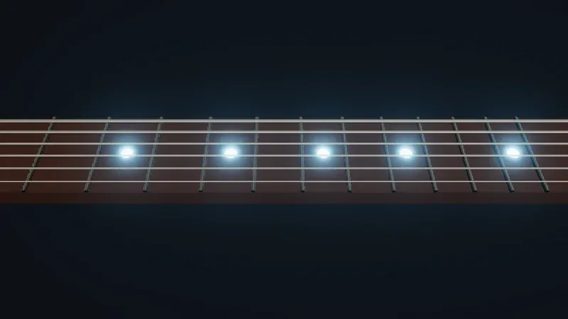 A dark fretboard seen from above at an angle, with five round inlays glowing pale blue, each surrounded by a soft blue halo that spreads over the frets and strings nearby.
